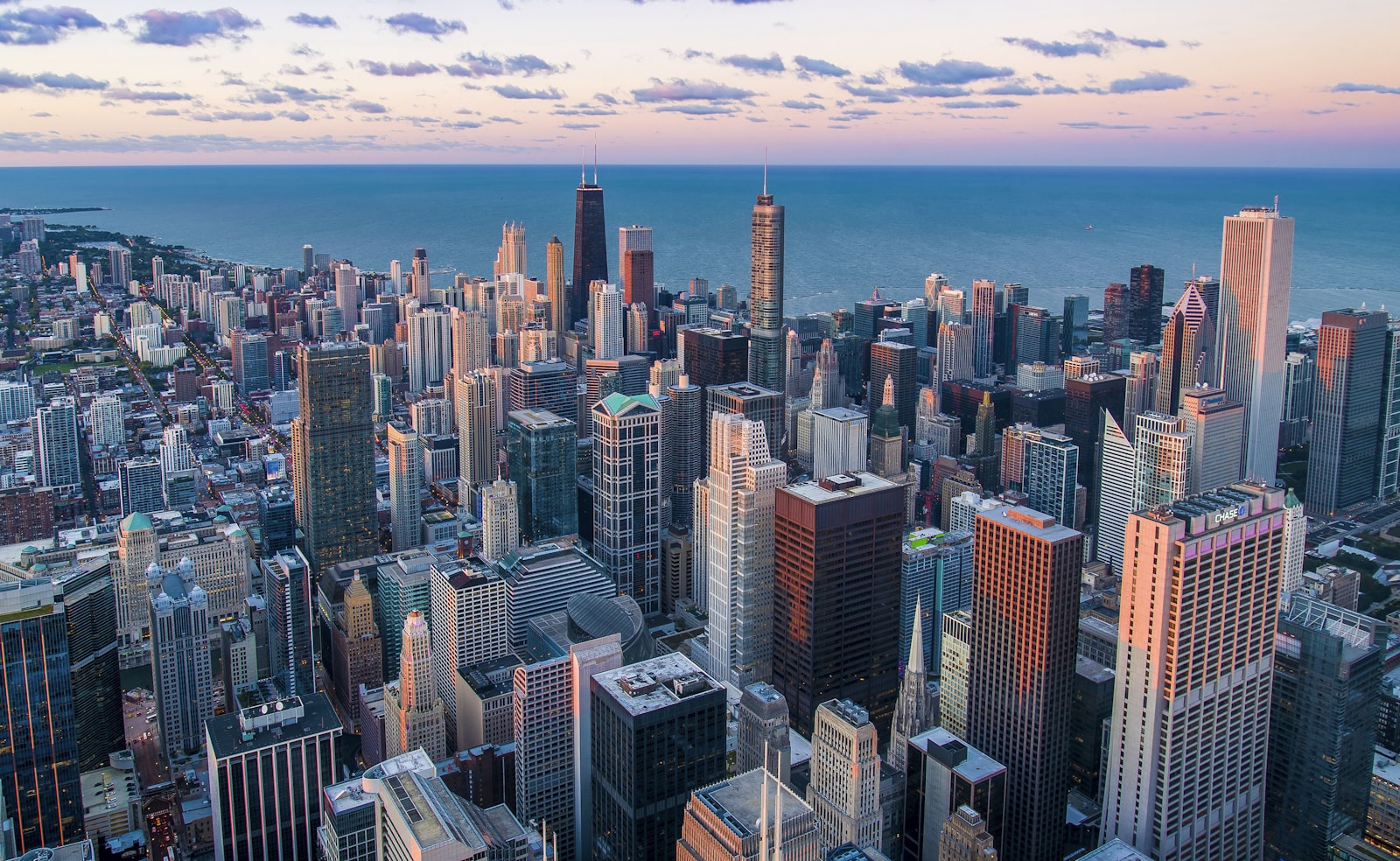 Chicago skyline at golden hour, viewed across the river